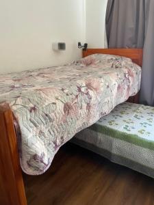 Ένα ή περισσότερα κρεβάτια σε δωμάτιο στο Casa Amainda