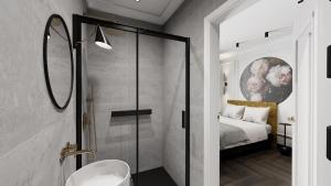 a bathroom with a shower and a bedroom with a bed at Deco Apartments Mariacka 8 - apartamenty w centrum Katowic in Katowice +173 photos