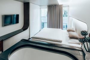 Postel nebo postele na pokoji v ubytování Hotel Q! Berlin