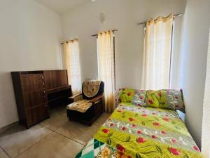 Postel nebo postele na pokoji v ubytování Nilaavu Homes - The Staycation at Wayanad