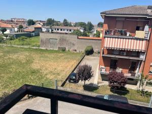 a view of a house with a car parked in a yard at Casa Laura in Rivolta dʼAdda