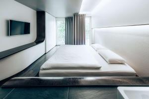 Postel nebo postele na pokoji v ubytování Hotel Q! Berlin