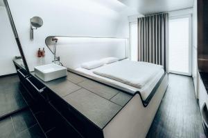 Postel nebo postele na pokoji v ubytování Hotel Q! Berlin