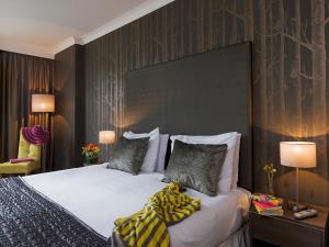 Voodi või voodid majutusasutuse Brandon House Hotel toas