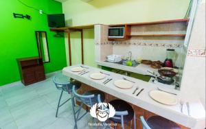 Kuchyň nebo kuchyňský kout v ubytování Hotel Villas de Plan