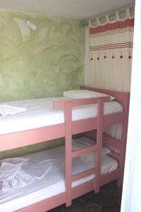 Posteľ alebo postele v izbe v ubytovaní Villas Georgy