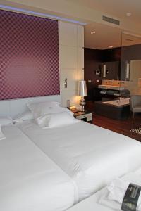 Кровать или кровати в номере Gran Hotel Nagari Boutique & Spa