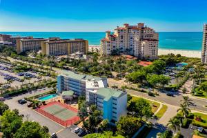 an aerial view of a city with a tennis court at Top floor condo, steps away from JW Marriott and Beach Access!! in Marco Island