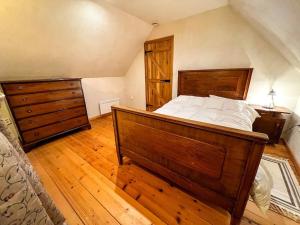 Ένα ή περισσότερα κρεβάτια σε δωμάτιο στο Hilib Cottage Retreat