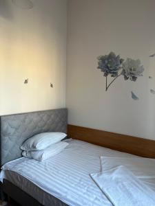 Łóżko lub łóżka w pokoju w obiekcie Hotel Haga