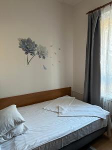 Łóżko lub łóżka w pokoju w obiekcie Hotel Haga