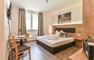 A bed or beds in a room at Hochmoderne Ferienwohnung