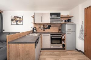 Kuchyň nebo kuchyňský kout v ubytování Haus Kofler + 7 fotografií