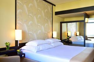 Cama ou camas em um quarto em Pestana Casino Park Hotel & Casino