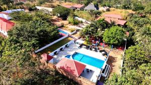 an aerial view of a swimming pool in a house at Chez BZ in Kindia +26 photos