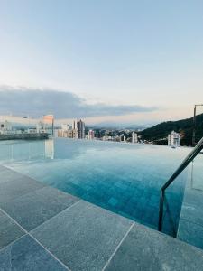 Πισίνα στο ή κοντά στο UP 401 | Mobiliado | WIFI | Piscina | Vaga