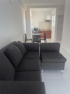 a living room with a couch and a table at Edificio Luggren in Formosa