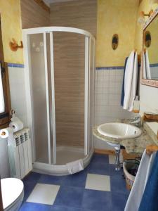 a bathroom with a shower and a sink at Casa la ilera in Casalarreina +17 photos