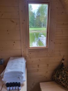 Gallery image of Pine Valley Villa - beautiful nature, jacuzzi, sauna, cozy log house in Inturkė