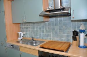 Η κουζίνα ή μικρή κουζίνα στο Appartement Ketsch Kutter - Nordseebad Burhave