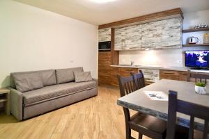 Μια τηλεόραση ή/και κέντρο ψυχαγωγίας στο Casa Fiocco Di Neve
