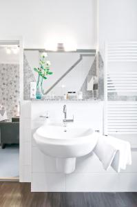 Ένα μπάνιο στο Hotel Service Apartments am Prinzenplatz - Superior