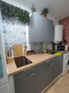 Kuchyň nebo kuchyňský kout v ubytování Olivia