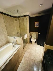 A bathroom at TaheeenS Suites at Berjaya Times Square