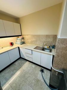 A kitchen or kitchenette at TaheeenS Suites at Berjaya Times Square