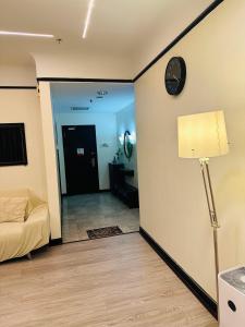 A seating area at TaheeenS Suites at Berjaya Times Square