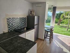 Fotografie z fotogalerie ubytování Studio Nina, accès plage et piscine v destinaci Cul de Sac + 18 fotografií