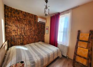 Letto o letti in una camera di Sighnaghi Art Hotel