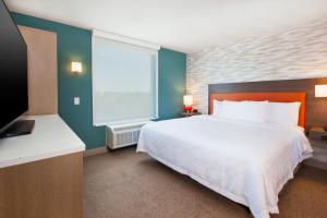 Postel nebo postele na pokoji v ubytování Home2 Suites By Hilton Grand Rapids South