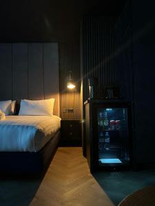 Postel nebo postele na pokoji v ubytování Secret Suites