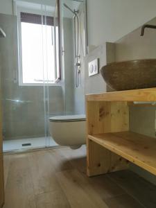 Koupelna v ubytování Giuly Home