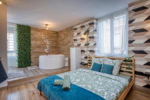 Ένα ή περισσότερα κρεβάτια σε δωμάτιο στο Le scandinave SPA