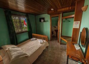 Letto o letti in una camera di Hotel Posada Los Delfines