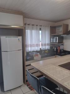 Kuchyň nebo kuchyňský kout v ubytování Residência acolhedora amamos receber hospedes