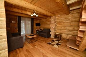 Posezení v ubytování HOTEL EMROVIC RAJ