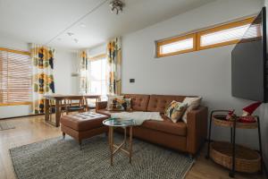 a living room with a couch and a table at LeviGold A3 in Levi