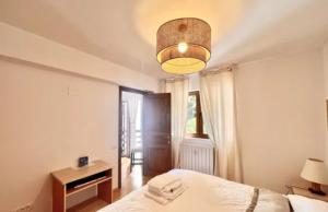 Postel nebo postele na pokoji v ubytování Maria Apartament