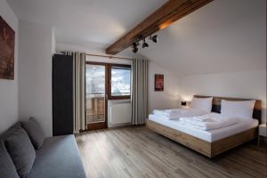Postel nebo postele na pokoji v ubytování Alpine View Apartments