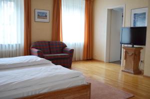 TV a/nebo společenská místnost v ubytování Alte Post - Hotel Am Rhein-Ufer Laufenburg