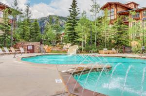 a swimming pool in the middle of a resort at Eagle Springs East 304: Josephine's Suite in Solitude