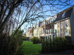 Κήπος έξω από το Apartment in Netherlands near the Beach