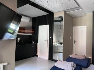 Posteľ alebo postele v izbe v ubytovaní Rakowicka Top Apartaments Superior