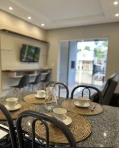 Μια τηλεόραση ή/και κέντρο ψυχαγωγίας στο Conforto em Foz Apartamento Central com Tudo ao Seu Alcance