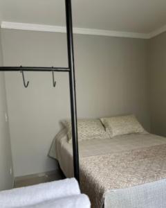 Ένα ή περισσότερα κρεβάτια σε δωμάτιο στο Conforto em Foz Apartamento Central com Tudo ao Seu Alcance +5 φωτογραφίες