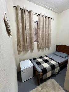 Reserva do Bosque Hospedaria e Natureza客房内的一张或多张床位