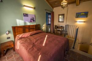 Postel nebo postele na pokoji v ubytování Albergo Ristorante Garibaldi